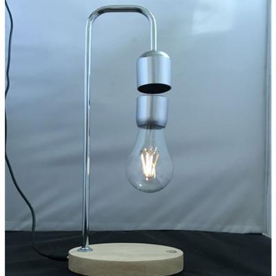 China ABS Wooden Base 360 Rotation Magnetic Hanging Light Table Led Levitation Floating Light Lamp for sale