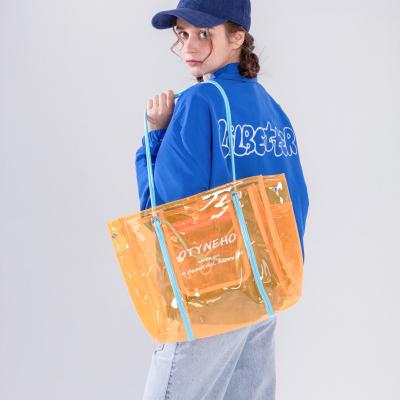 China New Fashion PVC Tote Bag Transparent Clear Tote Bag Beach Travel Bag for sale