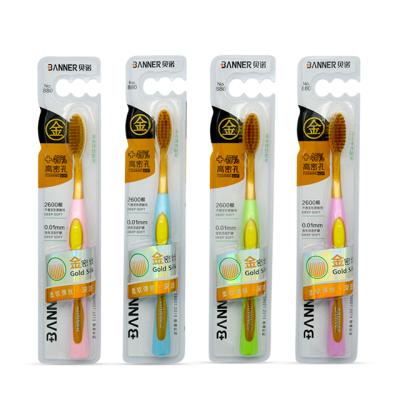 China Disposable golden toothbrush with golden bristles deep cleaning for sale