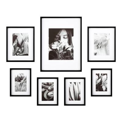 China 4x6 6x8 5x7 8x10 Fashionable Simple Elegant Black MDF Photo Frame Collage Frame Wooden Wall Frame Set for sale