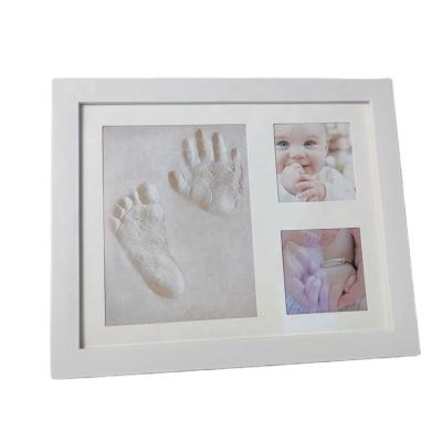 China Baby Newborn Babies Handprint Wholesale Hot Selling Yprint Photo Frame and Office Clay Photo Frame Gift Footprint Set for sale