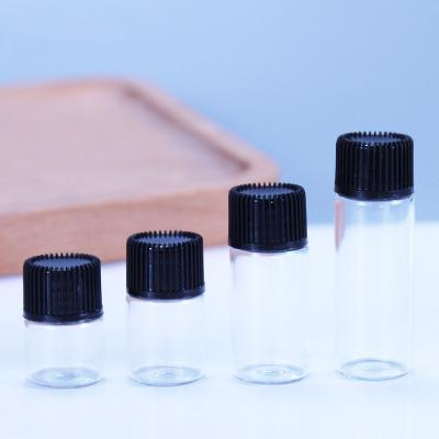 China 1ml 2ml 3ml 5ml Mini Sample Amber Glass Vial Personal Care Essential Oil Glass Bottle With Inner Plug And Screw Cap for sale