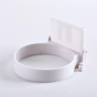 China Minimalist Minimalist No Hole Bathroom Toilet Shelf Wall Hanging Storage Rack Creative Plastic Hairdryer Holder for sale