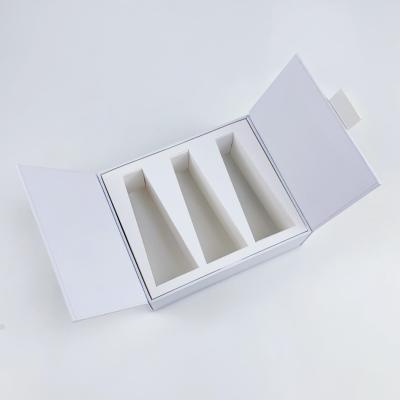 China Customized Designs Paper Box Packaging Eco-friendly White Double Door Magnetic Gift Box Essence Skincare Packaging Box for sale