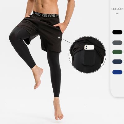 China Antibacterial Mens Double Layer Basketball Sports Training Gym Fitness Pants Mens Shorts Pants With Pockets for sale