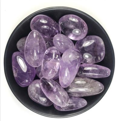 中国 紫色の宝石用原石の石の水晶未加工紫色の治療の石 販売のため