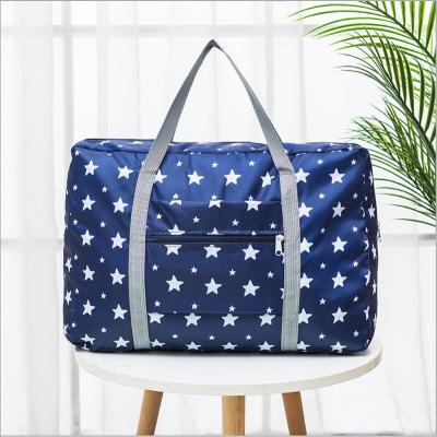 China Small Fresh Folding Folding Travel Storage Bag Jacquard Bag Clothing Organizer Bag for sale