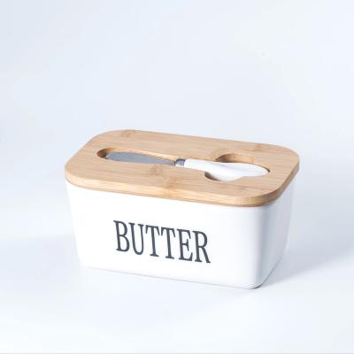 China Freshness Preservation 650ML Kitchen porcelain Rectangle butter keeper food storage White Ceramic Butter Dish With Bamboo Lid and knife for sale