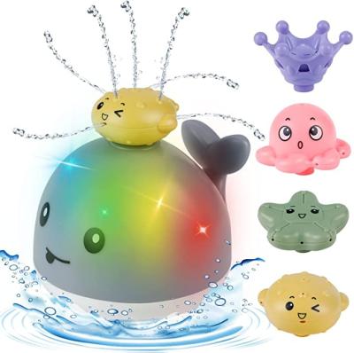China 2022 Electric Water Tool Baby Kids Spray Induction Squirt Ball Baby Bathroom Bath Light Music Splashing Toy Squirt Whale for sale