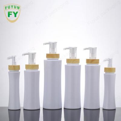 China bomba plástica feita sob encomenda da loção da garrafa do champô de 200ml 350ml para o sabão do distribuidor à venda