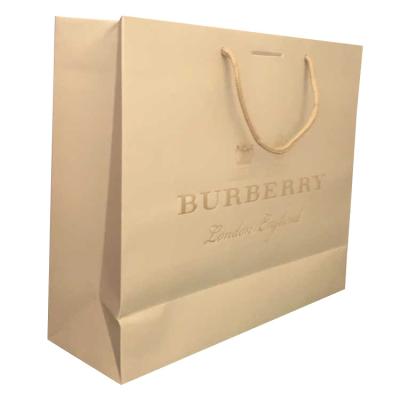 China Recycled Materials Wholesales Custom Paper Clothing Shopping Bag Logo Printed Cheap Recycled White Tote Bag for sale