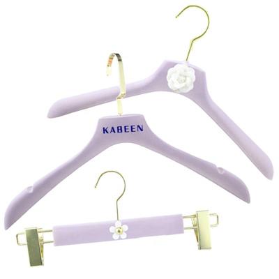 China Multi-Functional/ABS/ECO friendly hot sale swivel metal hook luxury purple flocked coat hanger velvet women dress hangers custom logo brand for fashion store for sale