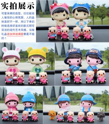 China LEDs Solar Energy Accessories Decoration Solar Shaking Head Cute Cartoon Doll Car Decoration for sale