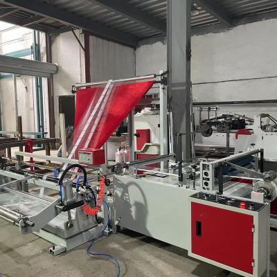 China High Speed Plastic Bag PP BOPP Plastic Bag Edge Folding& Winding Machine for sale