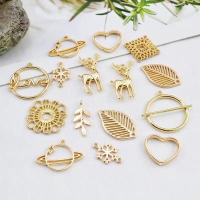 China Jewelry Making Geometric simplicity alloy pendant personality Planet leaf Snowflake elk hand for DIY earring material accessories for sale