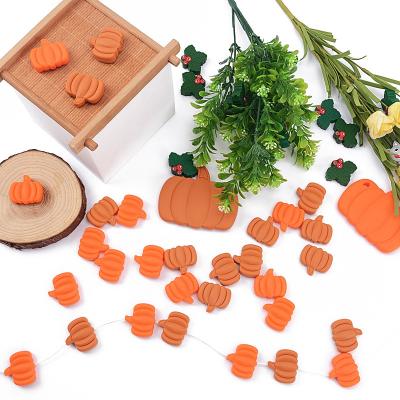 China Non-toxic 100% Food Grade 2023 New Halloween 26*31mm Silicone Beads Skull Head Silicone Beads Pumpkin Teething Wholesale Beads For Bracelet Making for sale