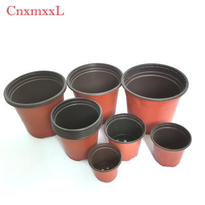 China Double-color plastic flower pot plastic plant pot plastic flower container in quality assurance. à venda