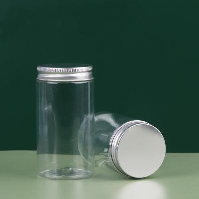 China Food Cosmetic Jars Plastic Factory Supply Various Foods Used Transparent Plastic Screw Cap Pet Jars With Silver Aluminum Cap for sale