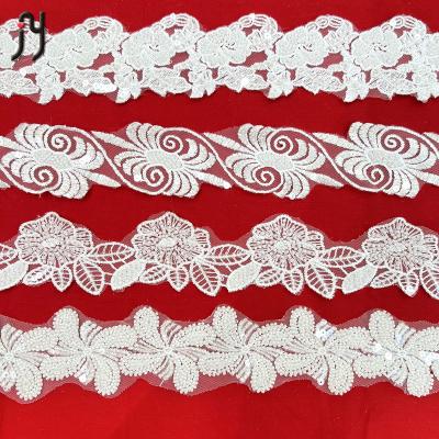 China White beaded textile 2022 lace fabric applique embroidery elastic African fancy material dress with lacing for sale