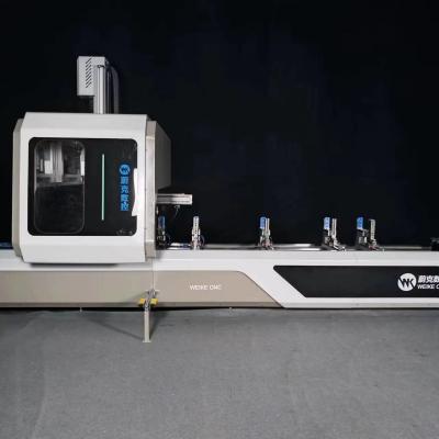 China Centro de processamento de perfis de alumínio CNC de 4 eixos para perfuração, fresagem e fresagem de extremos à venda