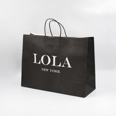 China Black White Printing Kraft Paper Bag Reusable With Handles for sale