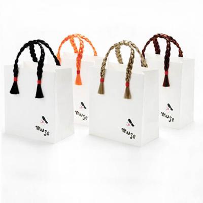 China Recycled Materials Size Package Paper Handle Paper Bag Luxury Custom Kraft Paper With Your Logo Clothing Shopping Bag for sale