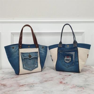 China Japan style high quality spliced jeans bag 2023 ladies handbags women shoulder sling bags fashion shoulder armpit bag for sale