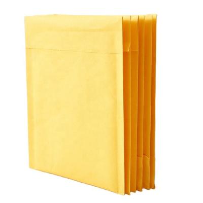 China Newest Strong Adhesive Selling Books Documents Clothes Courier Bags Bubble Mail Packing Pure Yellow Plastic Bag for sale
