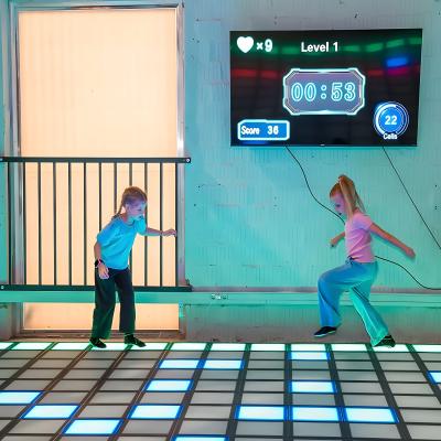 China Jumping Grid Juego de jugadores múltiples Led Dance Floor Tile para el parque de diversiones en venta