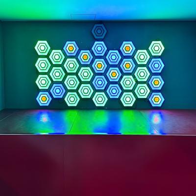 China Nueva sala de juegos activa LED sensor inducido luz interactiva hexágono Activar juegos Arena en venta