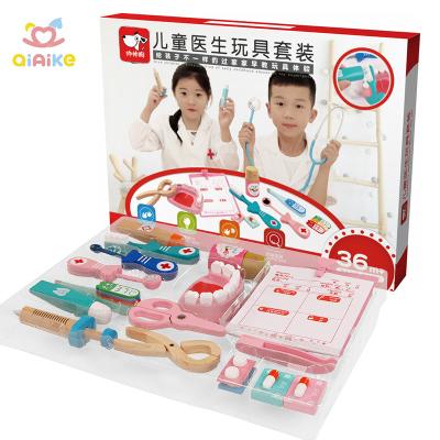 China Educational toy 2021 Children's wooden early education role play Simulat doctor toy set baby syringe medicine kit gift box for sale