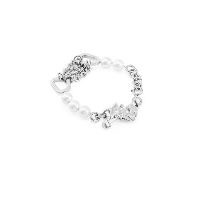 China Free Sample Industrial Designer Pearl Beaded Babama Fancy Bracelet TRENDY - Titanium Stainless Steel Bracelet Stud and Pearl Bracelet for sale