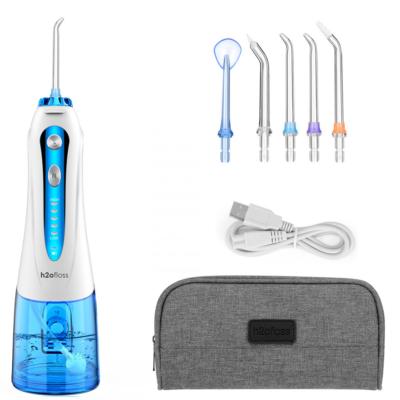 China Oral Irrigator Cheap Wholesale IPX7 Waterproof Electric Teeth Cleaning Device Home Travel Dental Floss Water Flosser for sale