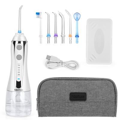 China Venda no mercado de grosso Irrigador oral barato IPX7 Impermeável OEM/ODM Dispositivo elétrico de limpeza de dentes Casa Viagens Floss Dental Flosser de água à venda