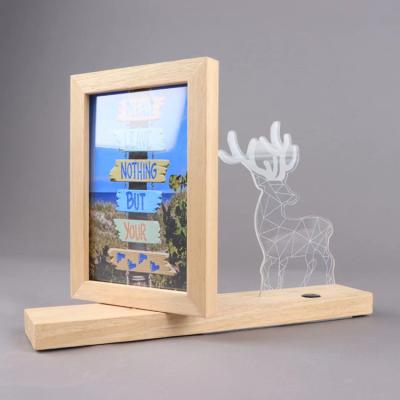 China Modern luxury new style solid wood double sided photo frame 360 degree rotation table top photo frame with LED light for sale