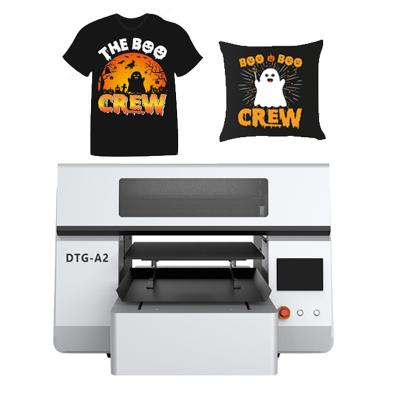 China Multi-Language Software & Global Shipping EPSON Print Head A2 DTG Flat Bed Printer for sale