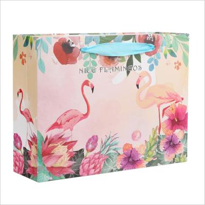 China Recycled Materials Custom Logo Printed Paper Shopping Bag Gift Packaging Black Paper Bag for sale