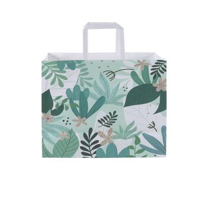 China Recycled Custom Printing Materials LOGO Kraft Paper Bag Handbag Gift Bag Packaging Bags for sale