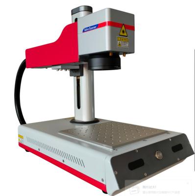 China Air-cooled QK-F20D Desktop fiber laser marking machine for All metal products and partial plastic products marking for sale