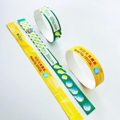 China Full Color Snap Closure tyvek wristbands paper Waterproof Sequential Numbering Barcoding for sale