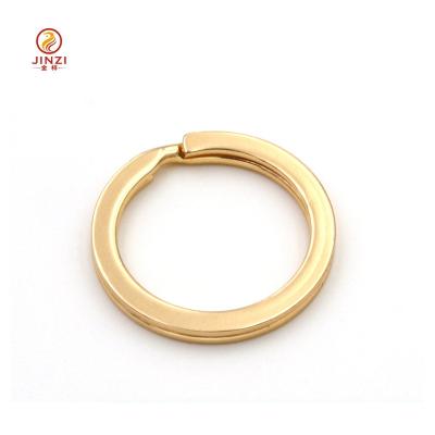China Wholesale custom shinning flat key chain gold color metal key ring for sale