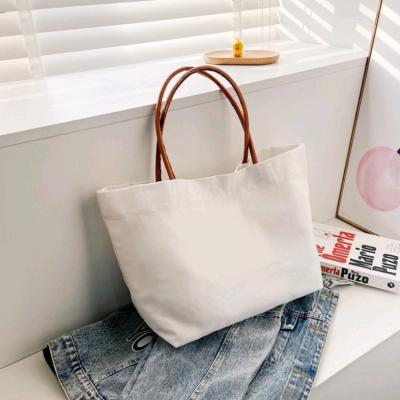 China Ladies Large Capacity Modern Simplicity Shoulder Canvas Tote Empty Handled Shopping Bag With Leather Handle for sale