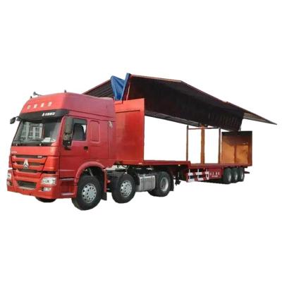 China 11meters long tri-axle Hydraulic wingspan stage performance semi-hanging trailer for sale