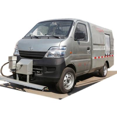 China CLW brand changan 1500liters tanker mini High pressure vacuum pump water cleaning truck on roadside for sale