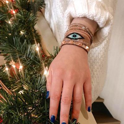 China Other hot selling Adjustable Bohemian Style Women eyes gold handmade ornament bangle lover luxury knitted matching beading bracelet for sale