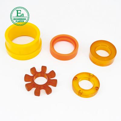 China As empresas plásticas da modelação por injeção do plutônio vestem - o bege resistente do coxim à venda