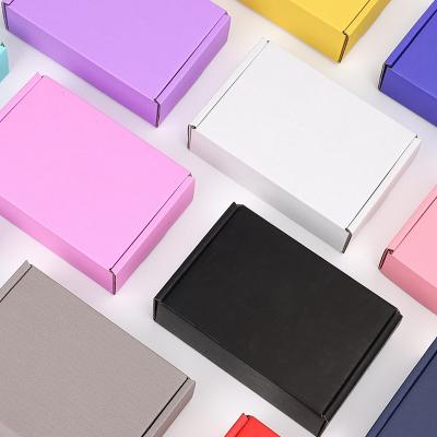 China Recycled Materials Custom Printed Pattern LOGO Folding Corrugated Shipping Boxes Black White Pink Mail Box for sale