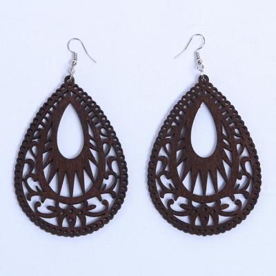China Charming Hot Sales Professional Wooden Earrings FASHIONABLE Vintage Hollowing Out Wooden Art Earring Jewelry for sale