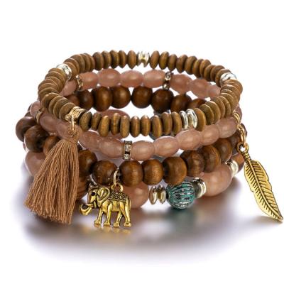 China Pray European charm and American retro wood beads beautiful small glass beads elephant elastic force bracelet for sale