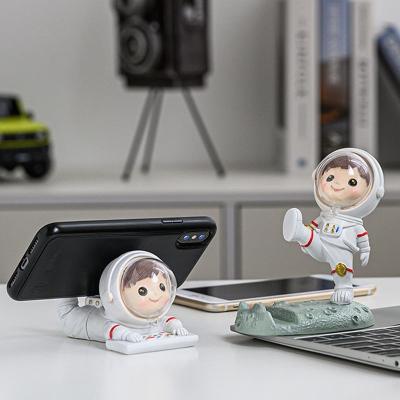China Tropical Other Home Creative Car Mobile Phone Bracket Astronaut Desktop Decor Portable Seat Structure Ornaments for sale